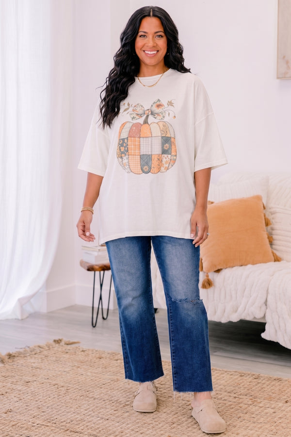 Chic Soul plus size clothing, ivory short sleeve boyfriend tee with patchwork pumpkin in the middle and a bow on the stem