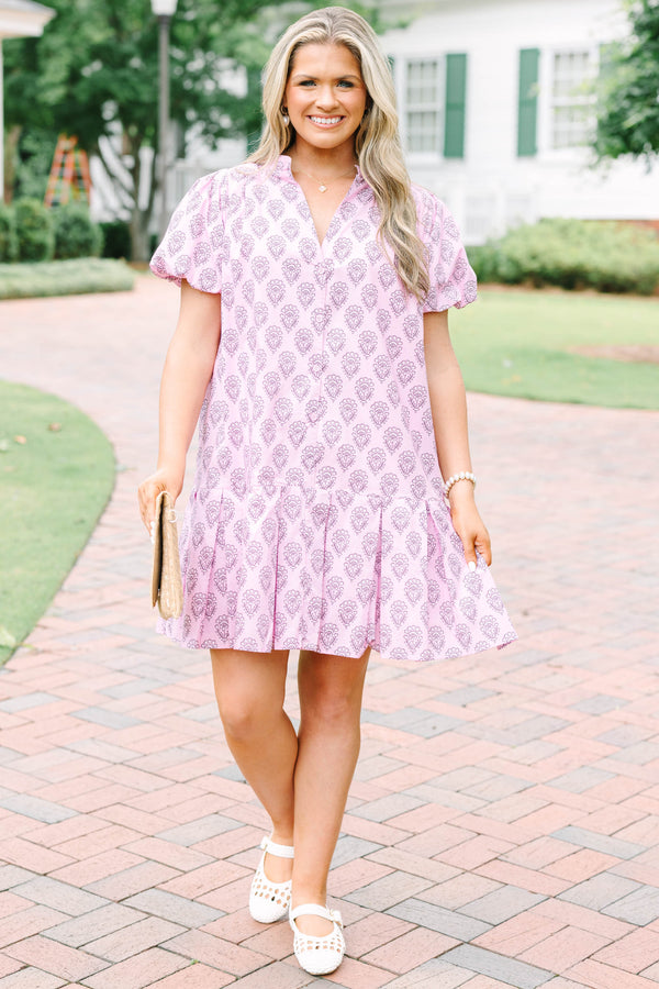 Plus Size pink mini dress with a purple floral block print, puff sleeves, and a tiered skirt.
