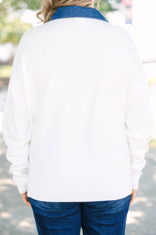 Plus size ivory sweater with a denim collar and button placket, featuring a soft, relaxed fit.