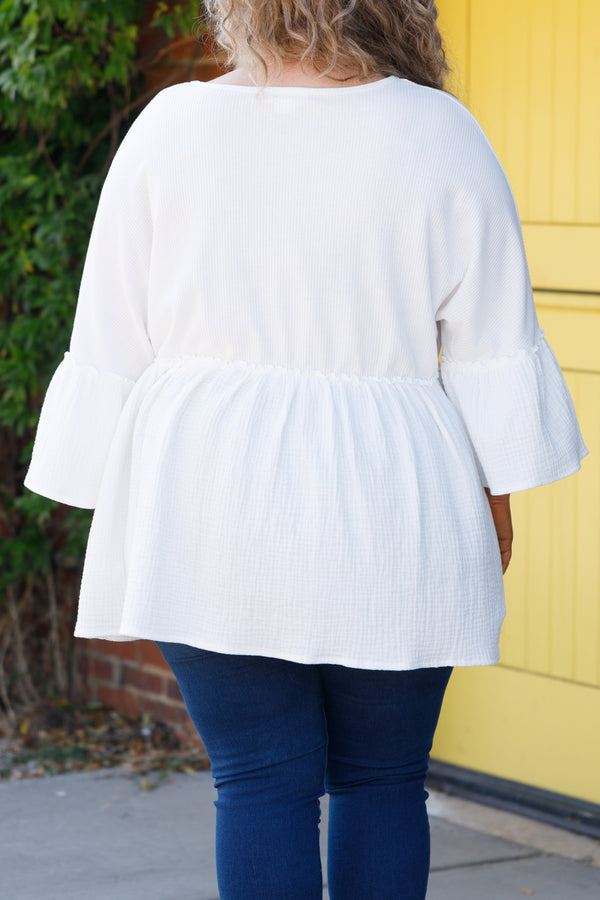Chic Soul plus size clothing, white textured babydoll top with bell sleeves