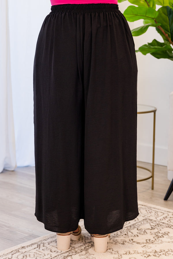 Chic Soul plus size clothing, black high-waisted wide-leg pants with waist-tie and slits in front of both pant legs