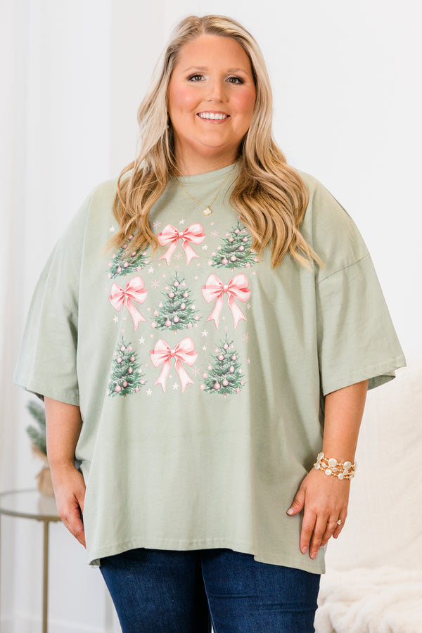 Chic Soul plus size clothing, short-sleeve light sage green graphic boyfriend tee with scoop-neckline and graphic art of pink bows and christmas trees with pink ornaments