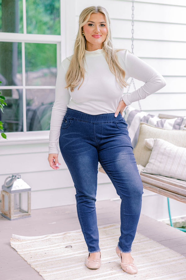 Chic Soul plus size clothing, dark wash full length denim jeggings with a slightly distressed hem