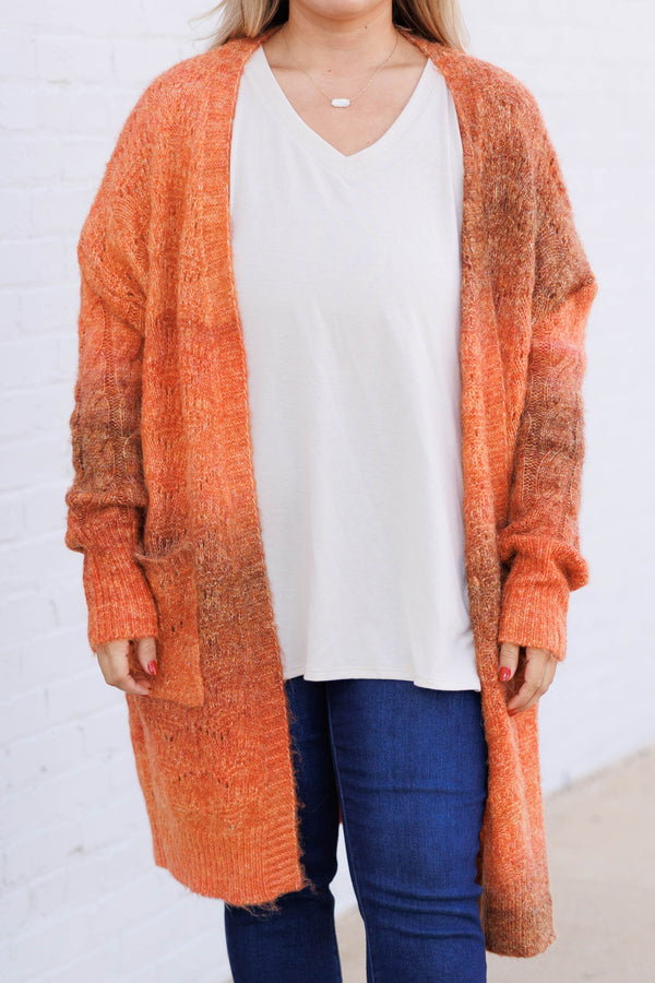 Chic Soul plus size clothing, rust orange colored cardigan sweater knee length fuzzy and oversized pockets on bottom sides