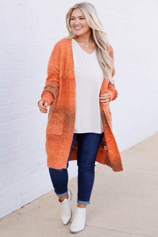 Chic Soul plus size clothing, rust orange colored cardigan sweater knee length fuzzy and oversized pockets on bottom sides