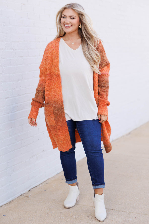 Chic Soul plus size clothing, rust orange colored cardigan sweater knee length fuzzy and oversized pockets on bottom sides