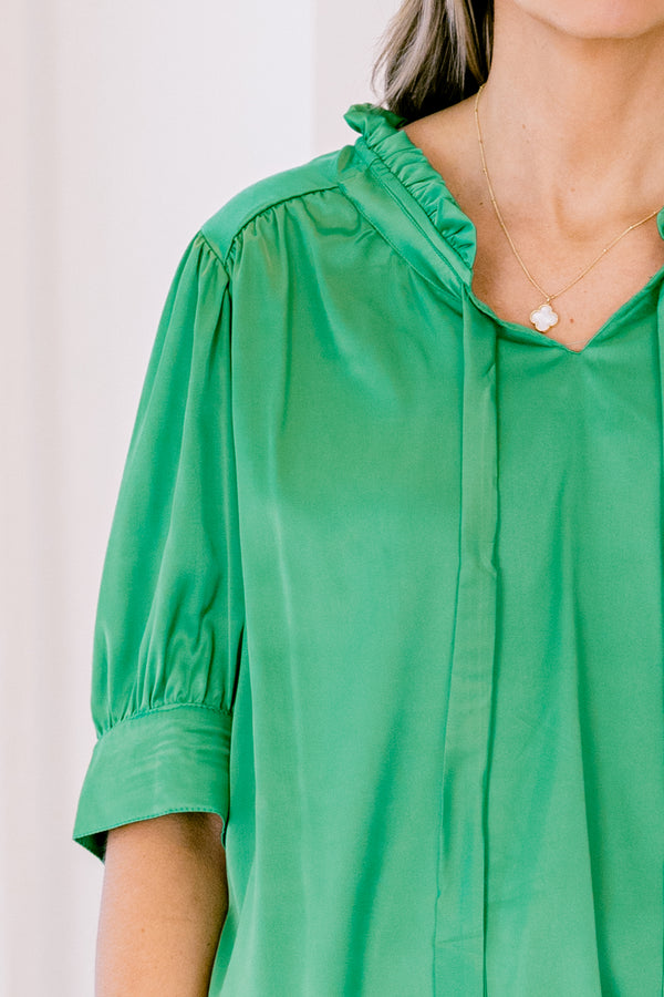 Chic Soul plus size clothing, short-puffed-sleeve kelly green top with a ruffled neckline with a tie 