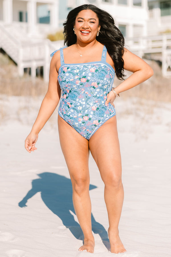 Chic soul plus size clothing, blue one piece swimsuit with multicolor floral print, square neckline, and tie shoulder straps.