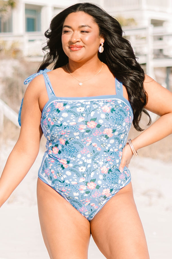 Chic soul plus size clothing, blue one piece swimsuit with multicolor floral print, square neckline, and tie shoulder straps.