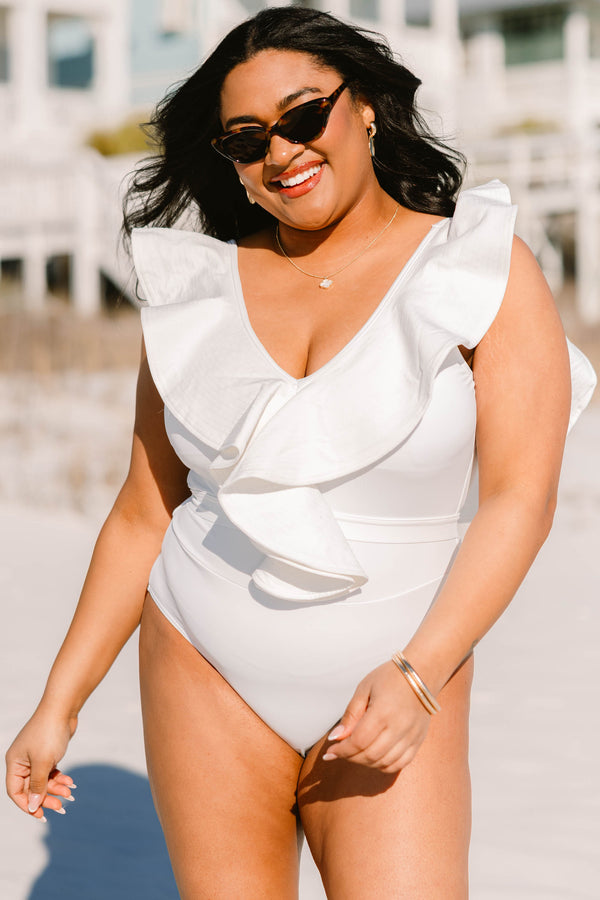 Chic Soul plus size clothing, overlaying ruffled white swimsuit with a deep-v-neckline and a tie closure belt