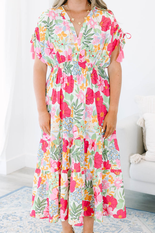Plus Size pink floral maxi dress with a V-neckline, smocked waist, and tiered skirt.
