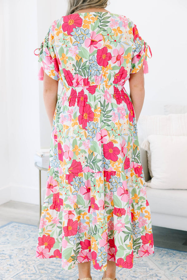 Plus Size pink floral maxi dress with a V-neckline, smocked waist, and tiered skirt.