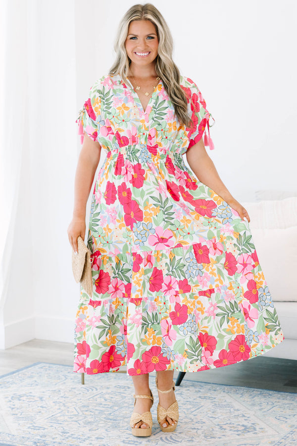 Plus Size pink floral maxi dress with a V-neckline, smocked waist, and tiered skirt.