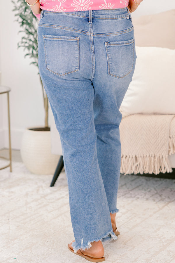 Chic Soul plus size clothing, medium wash straight leg jeans with front and back pockets as well as fringe distressed details at the bottom of each pant leg