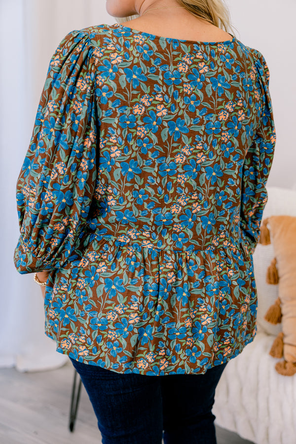 Chic Soul plus size clothing, brown floral top with long sleeves and three brown bow details going down the center of the shirt 
