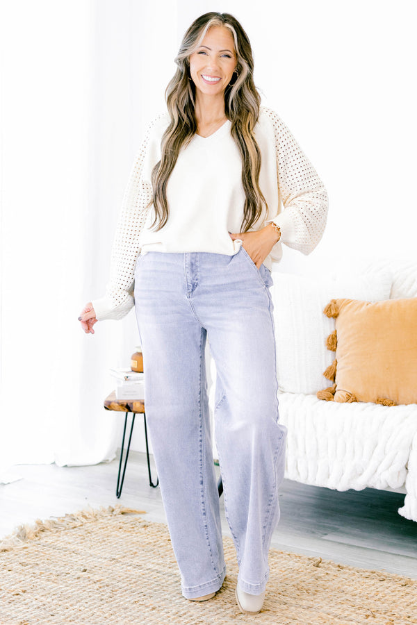 Chic Soul Plus size clothing, light wash flared jeans with cuffs at the end of the pant leg 