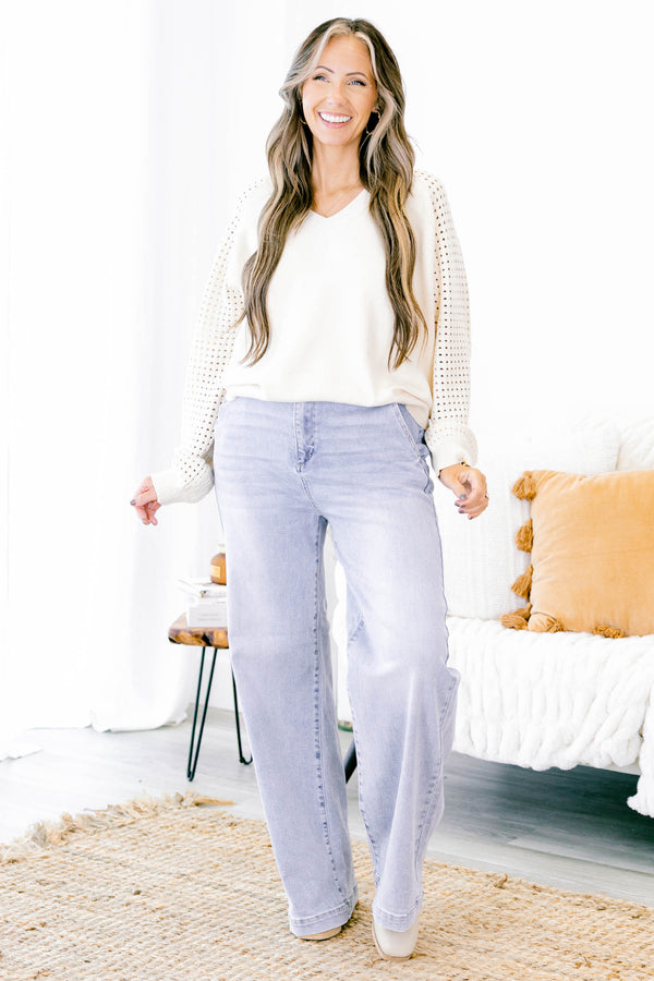 Chic Soul Plus size clothing, light wash flared jeans with cuffs at the end of the pant leg 