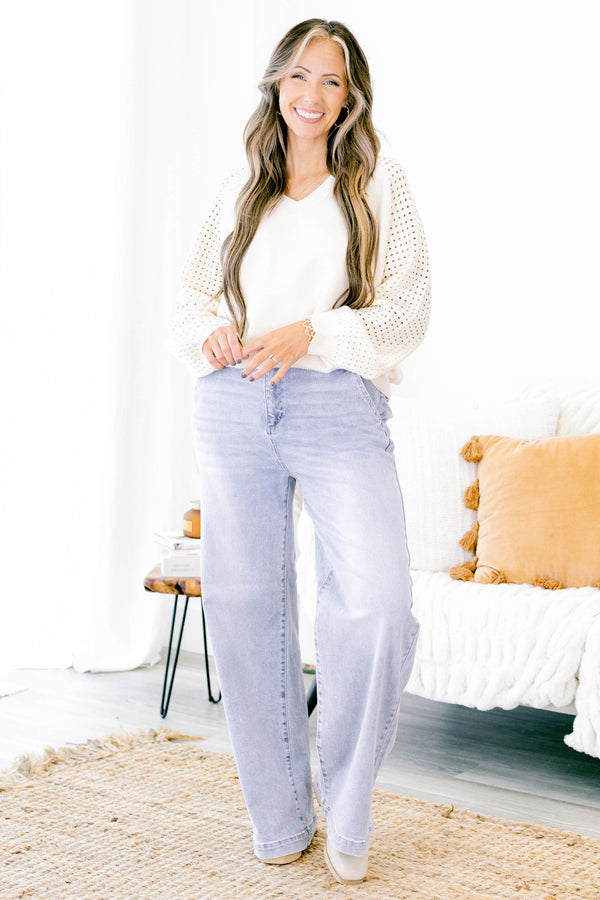 Chic Soul Plus size clothing, light wash flared jeans with cuffs at the end of the pant leg 