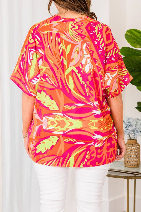 Chic Soul plus size clothing, orange short sleeve top with v-neckline and pink and yellow tropical details
