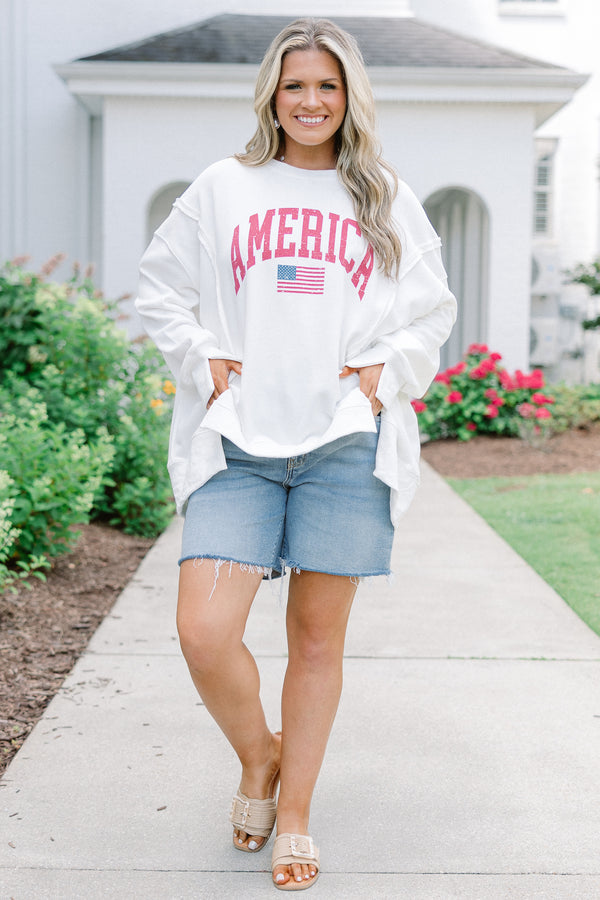 Plus Size ivory crew neck sweatshirt with a red distressed America graphic