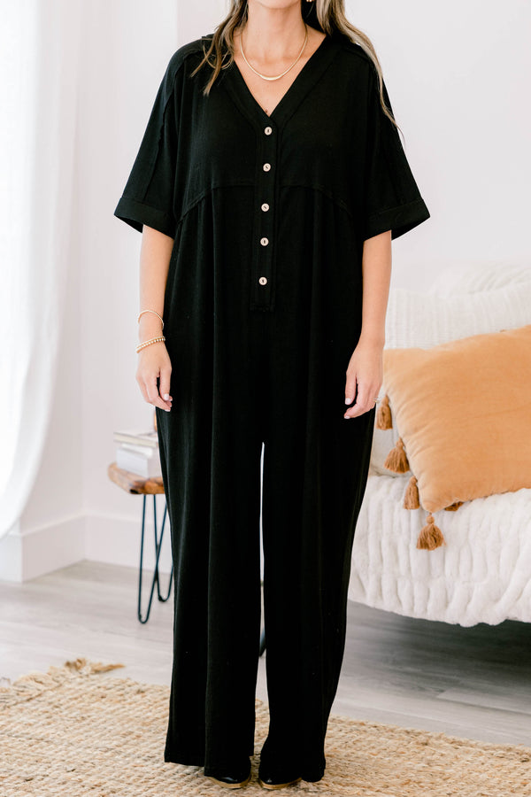 Chic Soul plus size clothing, black short bell sleeve pants jumpsuit with brown buttons down the front