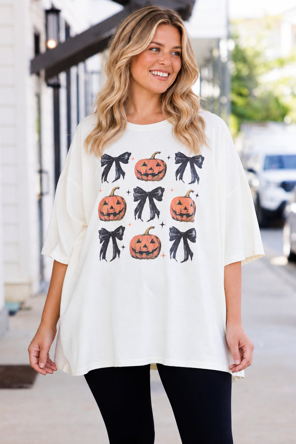Chic Soul plus size clothing, short-sleeve ivory boyfriend tee with graphic of black bows and carved pumpkins