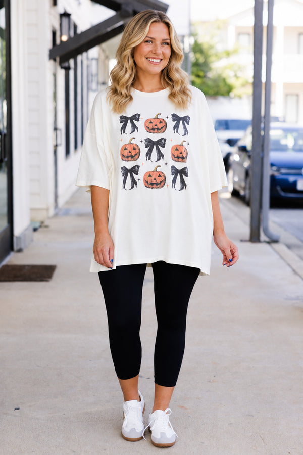 Chic Soul plus size clothing, short-sleeve ivory boyfriend tee with graphic of black bows and carved pumpkins
