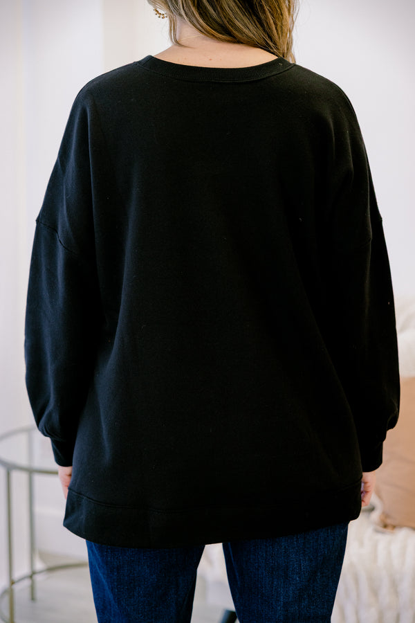 Chic Soul plus size clothing, black long sleeve pullover with round neckline and cuff sleeves with slight bubble sleeves