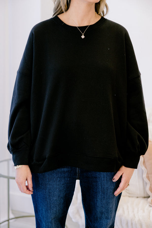 Chic Soul plus size clothing, black long sleeve pullover with round neckline and cuff sleeves with slight bubble sleeves