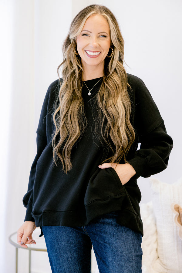 Chic Soul plus size clothing, black long sleeve pullover with round neckline and cuff sleeves with slight bubble sleeves