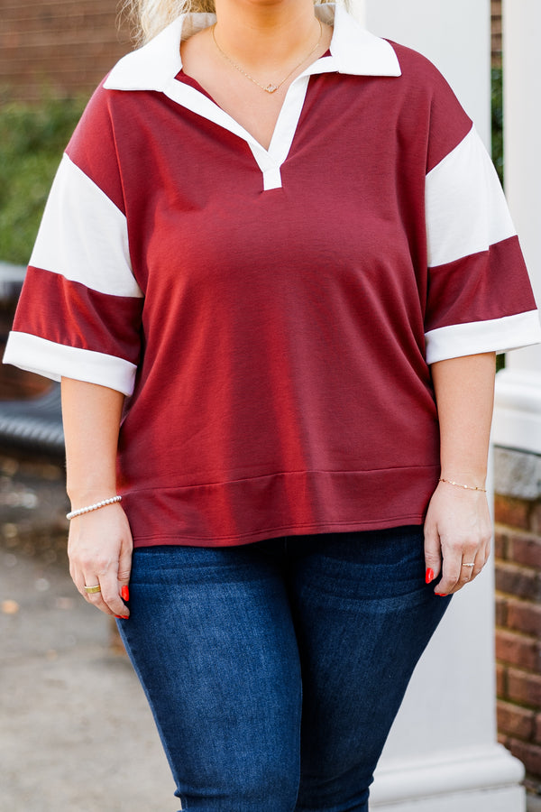 Chic Soul plus size clothing, short-sleeve marsala red top with v-neckline and white collar with white stripe color-block detailing on sleeves
