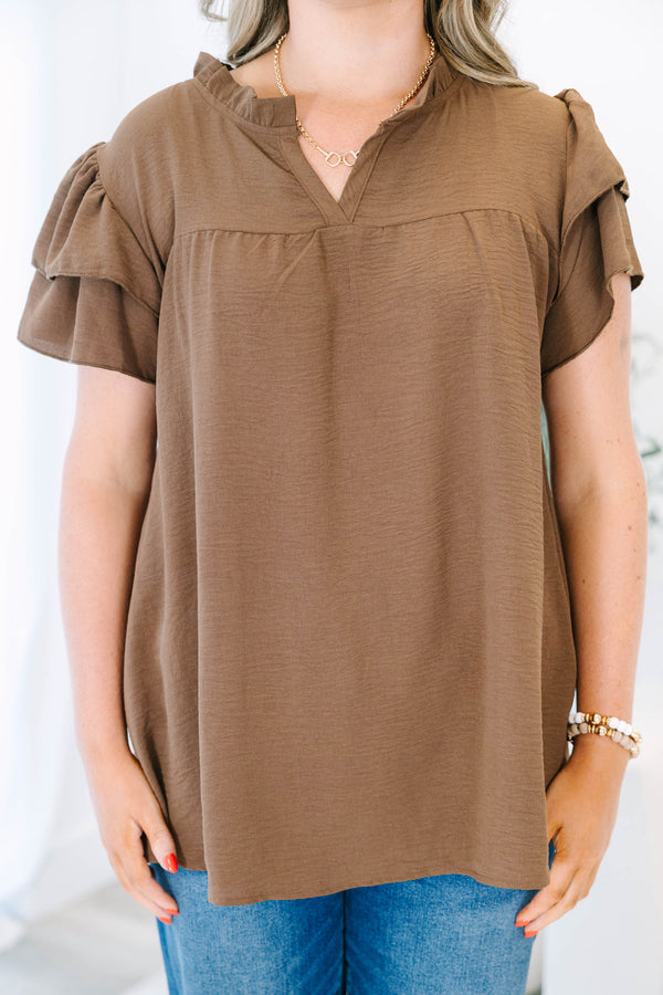 Plus Size brown short-sleeve top with ruffled sleeves, a V-neckline, and a relaxed fit.
