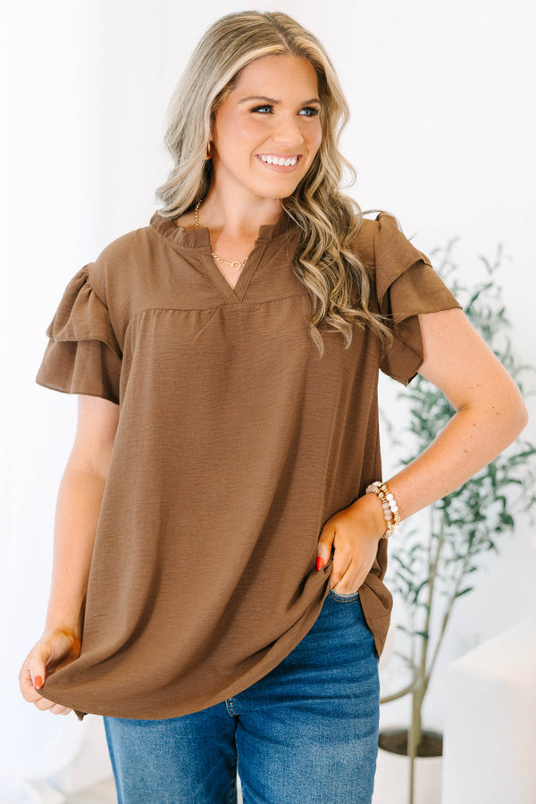 Plus Size brown short-sleeve top with ruffled sleeves, a V-neckline, and a relaxed fit.