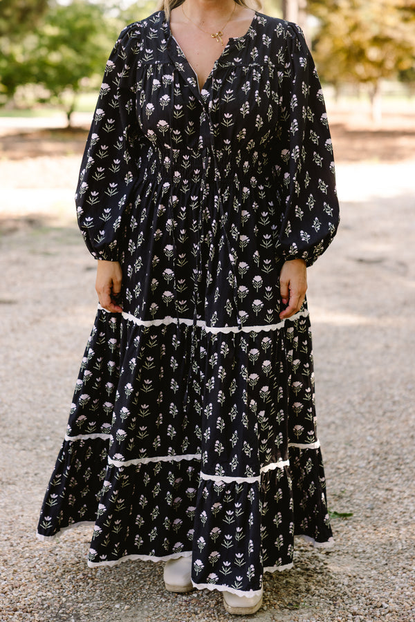 Chic Soul plus size clothing, black long sleeve tiered flowy maxi dress with light pink floral print and white scallops on the tiers 