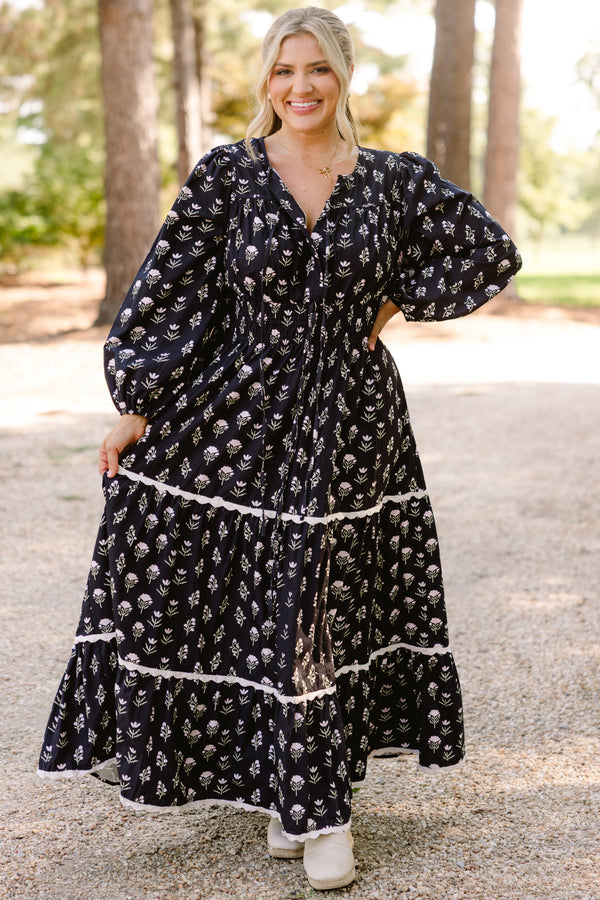 Chic Soul plus size clothing, black long sleeve tiered flowy maxi dress with light pink floral print and white scallops on the tiers 