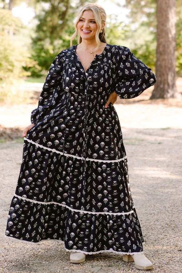 Chic Soul plus size clothing, black long sleeve tiered flowy maxi dress with light pink floral print and white scallops on the tiers 