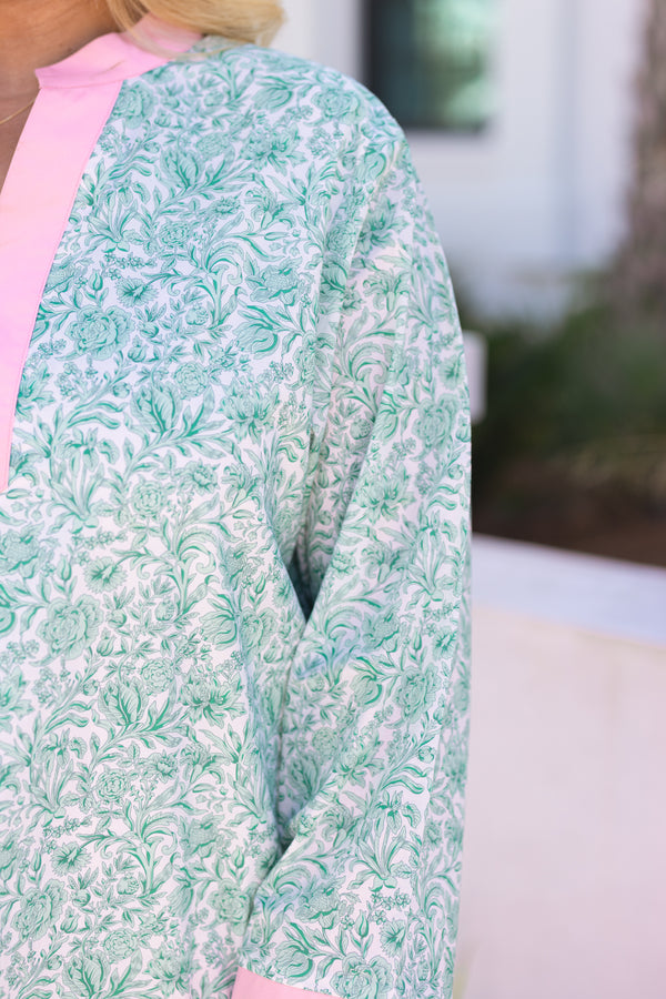 Chic Soul plus size clothing, green and white floral print long sleeve shift dress with light pink trim around the collar, sleeves, and hem