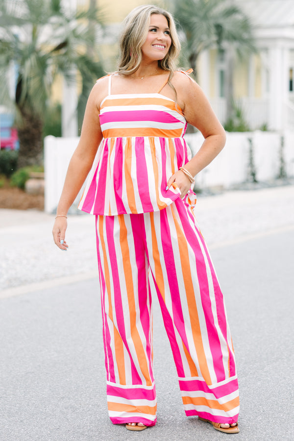 Chic Soul plus size clothing, baby doll sleeveless top with horizontal pink orange and white stripes on the chest area and vertical stripes under the chest area 
