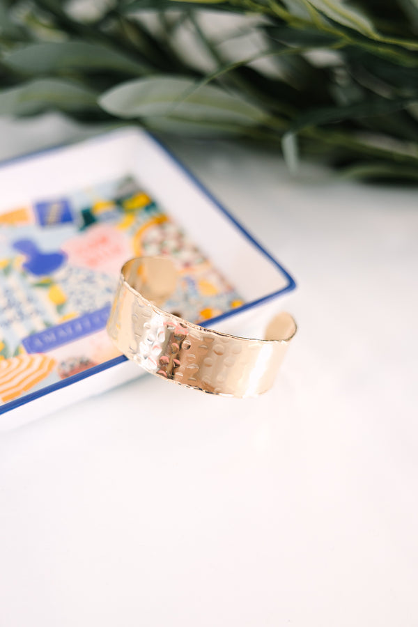 Plus Size hammered gold cuff bracelet with a wide band and textured finish.
