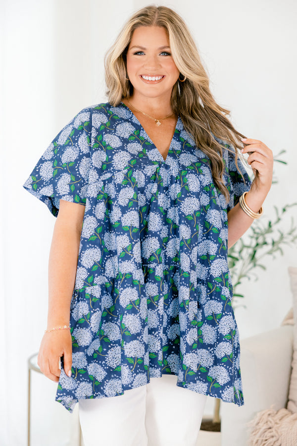 Chic Soul plus size clothing, navy blue short sleeve tiered babydoll top with v neckline and light blue hydrangeas on it
