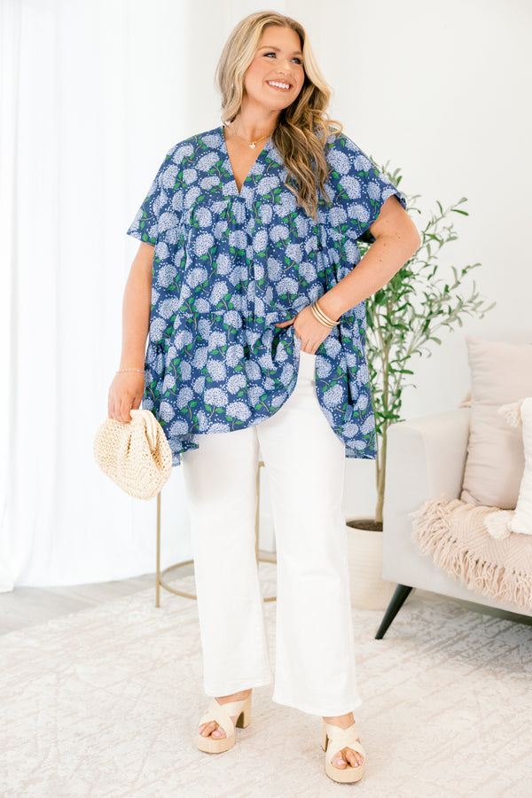 Chic Soul plus size clothing, navy blue short sleeve tiered babydoll top with v neckline and light blue hydrangeas on it
