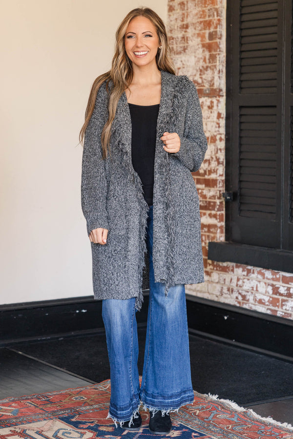 Chic Soul plus size clothing, heathered charcoal colored knee length cardigan with frayed detailing along the flaps of sweater, thicker material