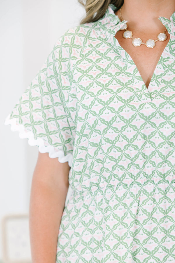 Plus size green and white patterned Maxi Dress with a flowy tiered skirt.