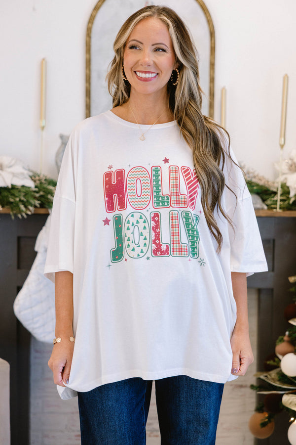 Chic Soul plus size clothing, white short sleeve boyfriend tee with “Holly Jolly” text in the middle with green and red holiday pattern on the inside and stars and snowflakes surrounding it