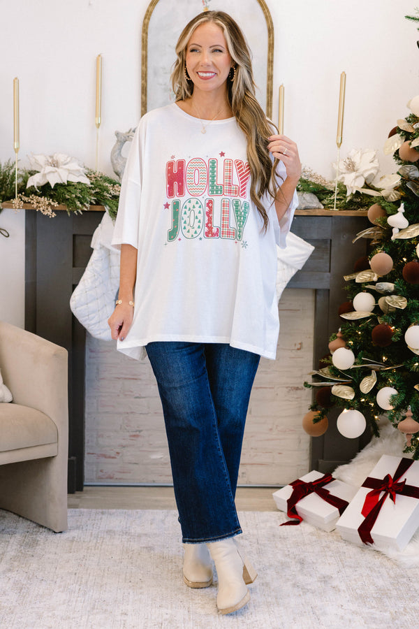 Chic Soul plus size clothing, white short sleeve boyfriend tee with “Holly Jolly” text in the middle with green and red holiday pattern on the inside and stars and snowflakes surrounding it