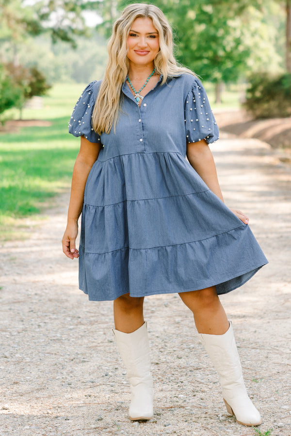 Chic Soul plus size clothing dark denim tiered baby doll dress with button detailing going to the bottom of the chest as well as pearl details on the bubble sleeves 