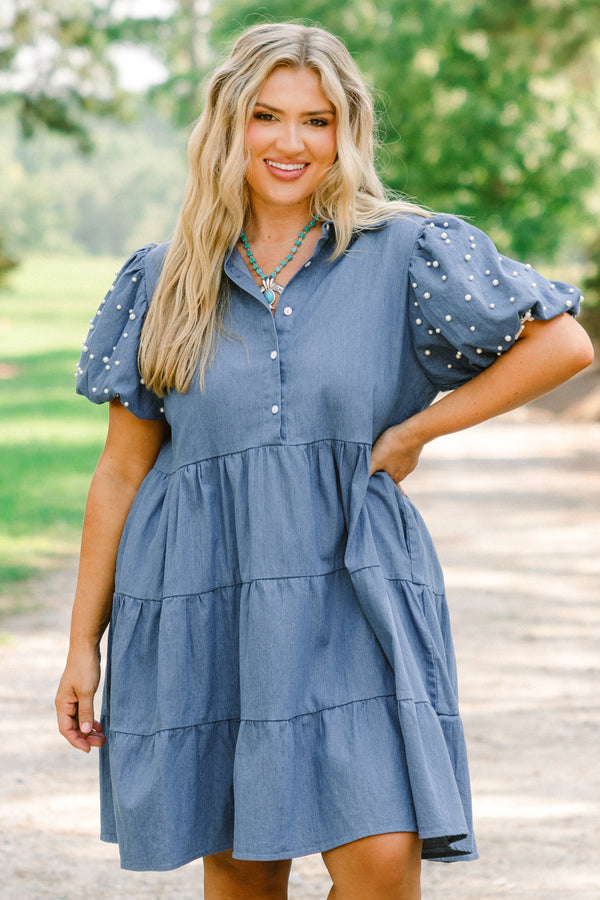 Chic Soul plus size clothing dark denim tiered baby doll dress with button detailing going to the bottom of the chest as well as pearl details on the bubble sleeves 