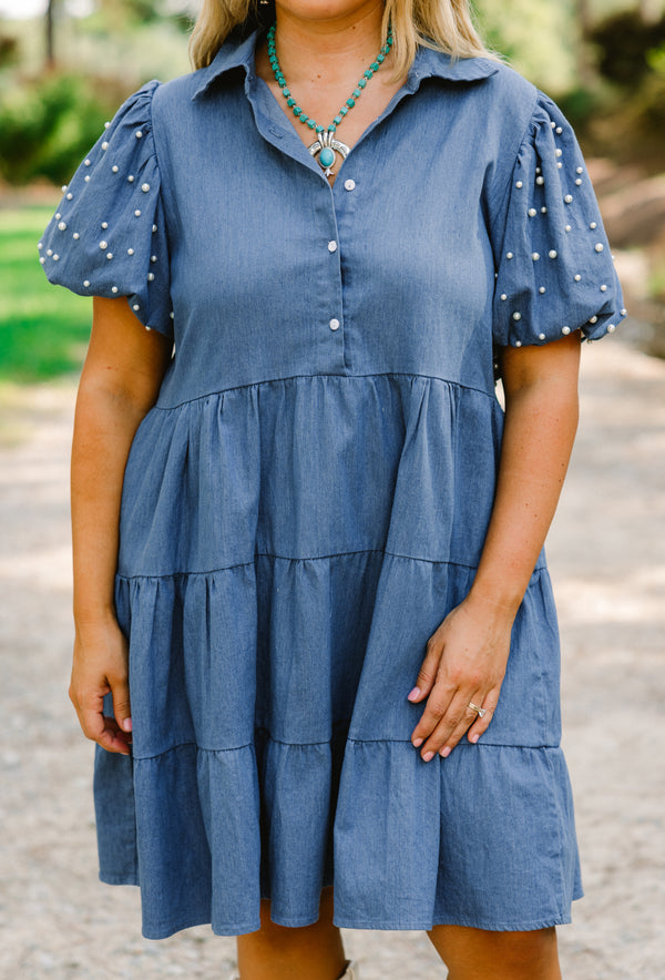 Chic Soul plus size clothing dark denim tiered baby doll dress with button detailing going to the bottom of the chest as well as pearl details on the bubble sleeves 