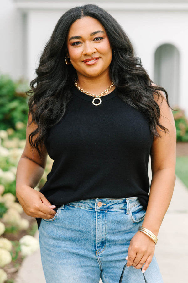 Plus Size black knit tank top with a high crew neckline and sleeveless design.