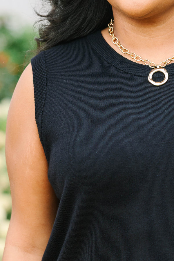 Plus Size black knit tank top with a high crew neckline and sleeveless design.